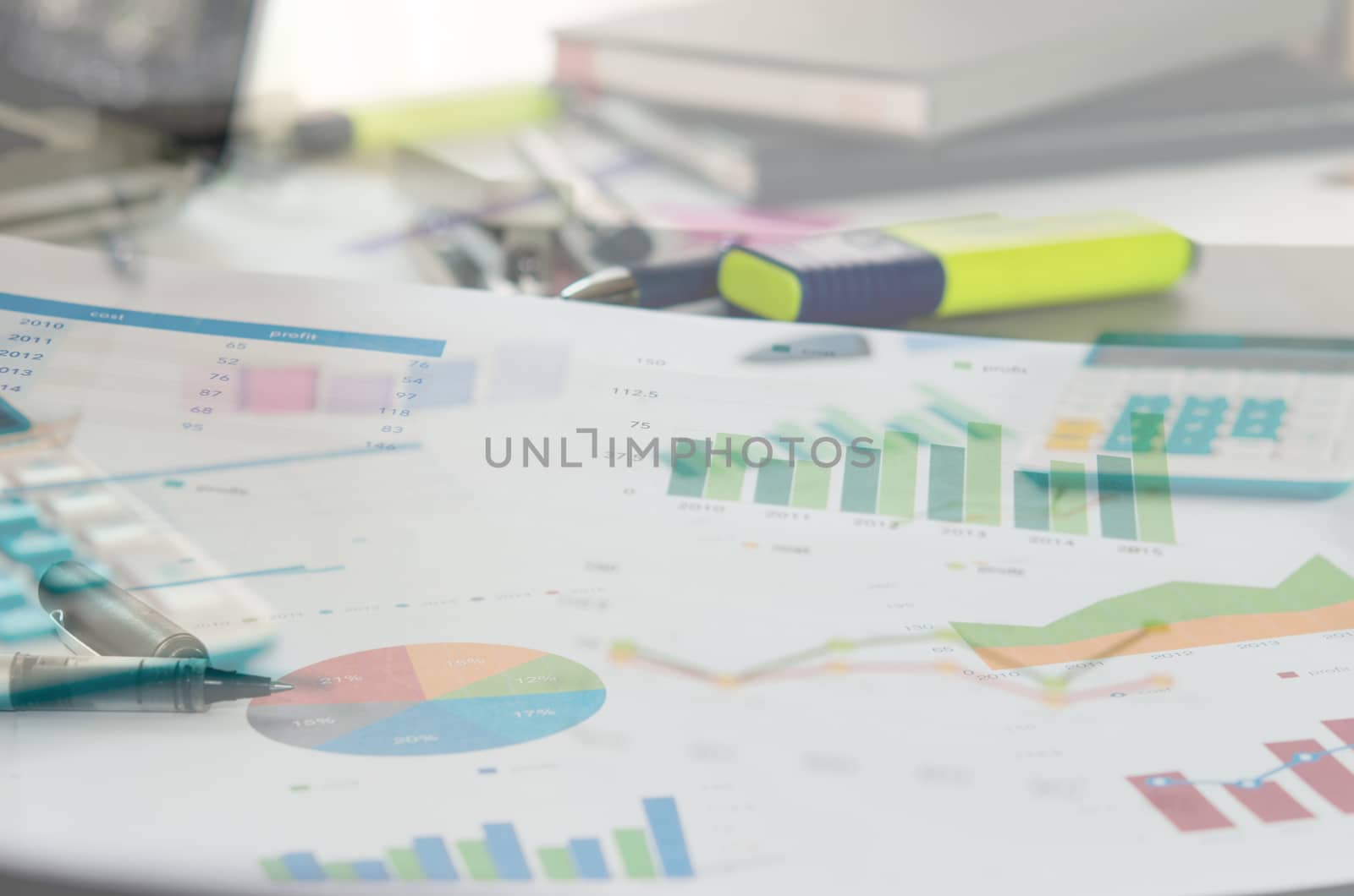 Graphs and charts, business table. The workplace of business people.