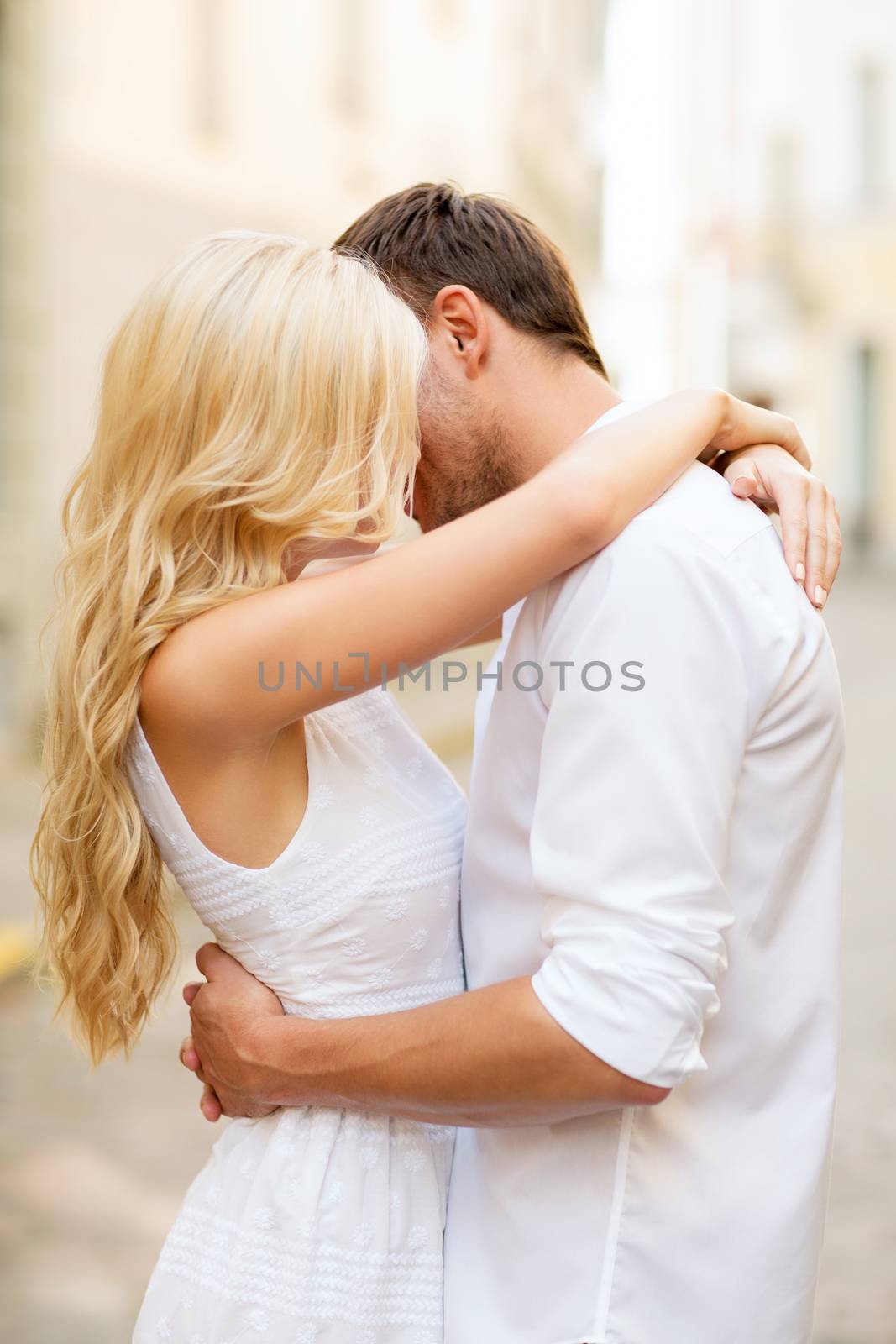 summer holidays and dating concept - couple in the city