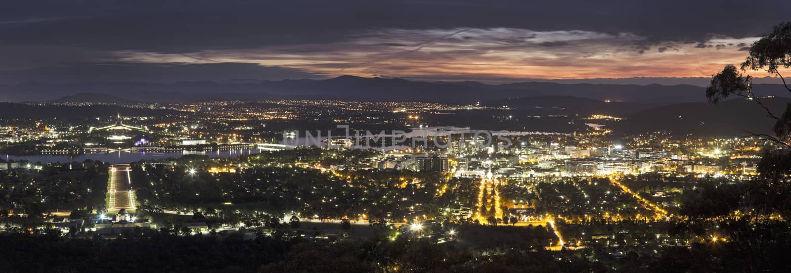 Panoramic view of Canberra at sunset by benkrut