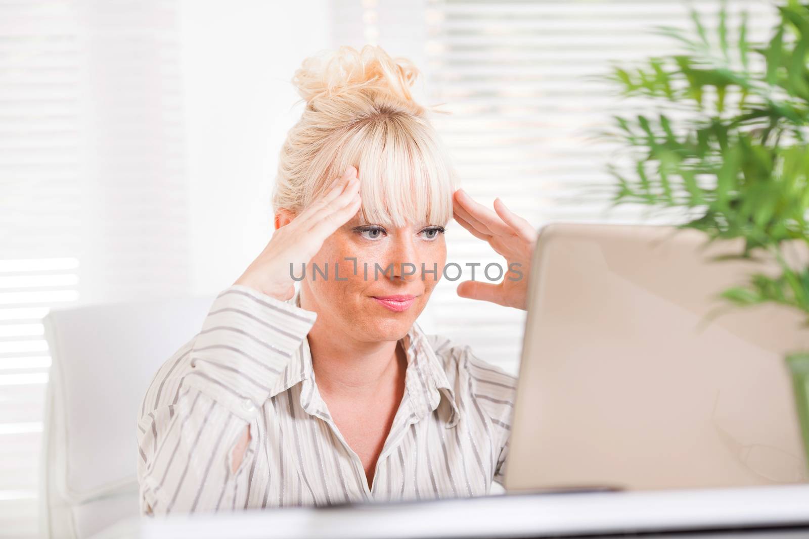 Beautiful mature Business woman having problems at work