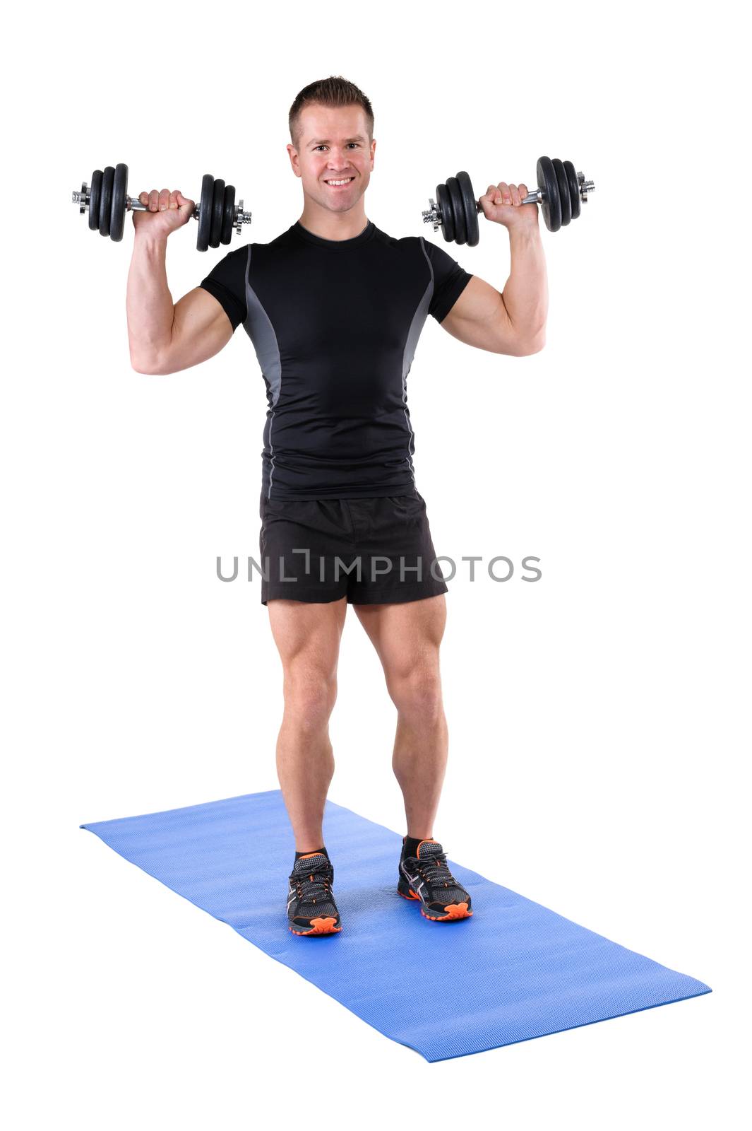 young man fitness instructor shows starting position of standing dumbbell shoulder press, isolated on white