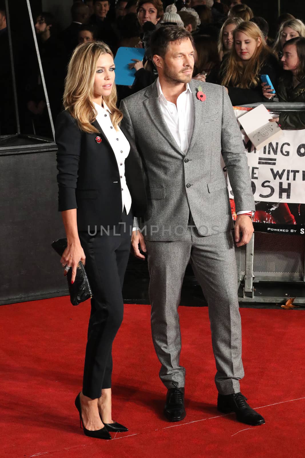 UNITED KINGDOM, London: Abbey Clancy and Paul Sculfor attend the UK premiere of The Hunger Games: Mockingjay - Part 2 at Odeon Leicester Square in London on November 5, 2015. 