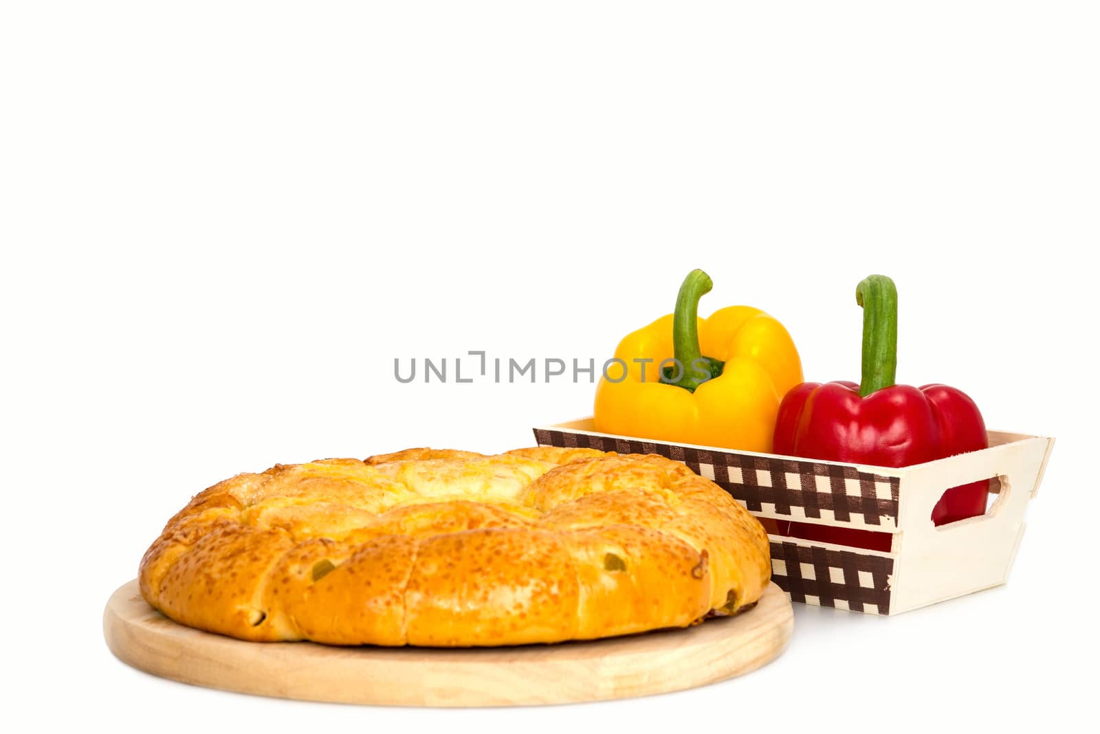Composition with bread and vegetable  isolated on white .