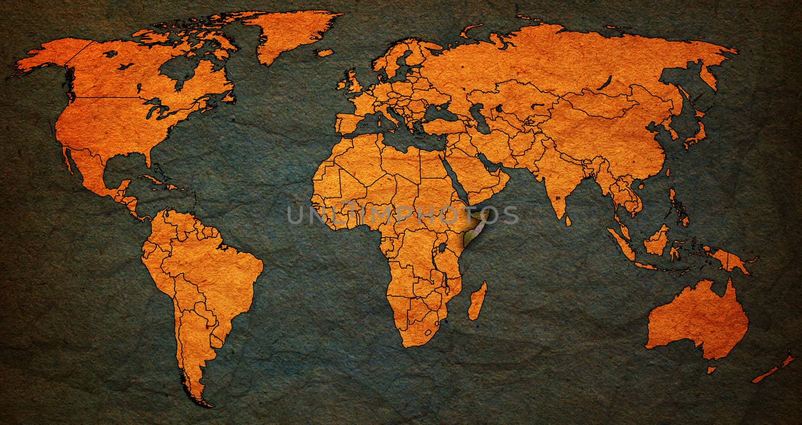 somalia flag on old vintage world map with national borders