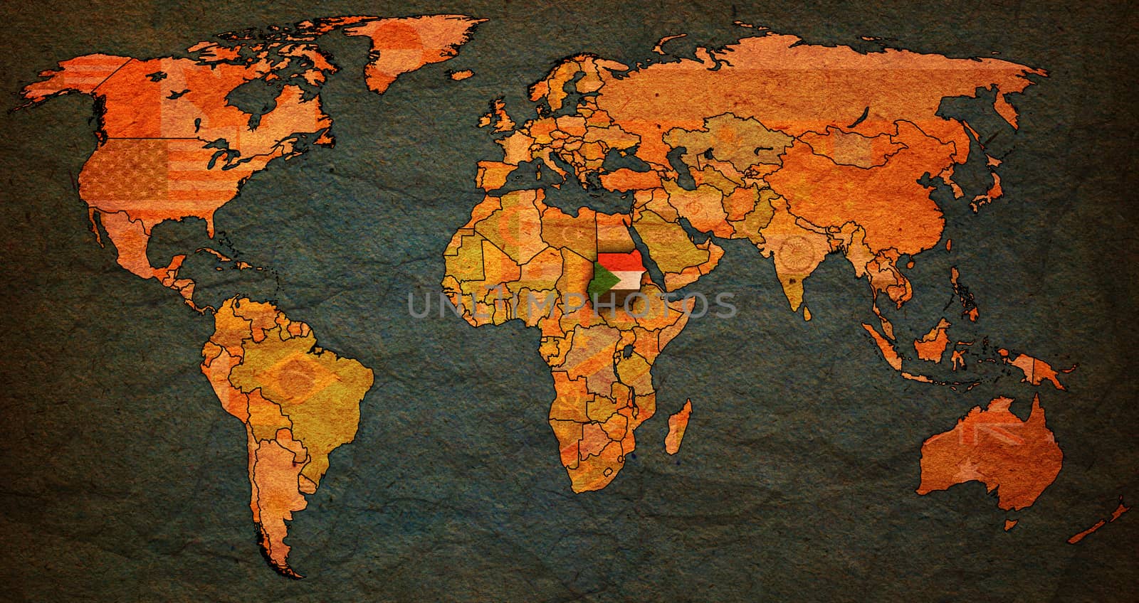 sudan flag on old vintage world map with national borders