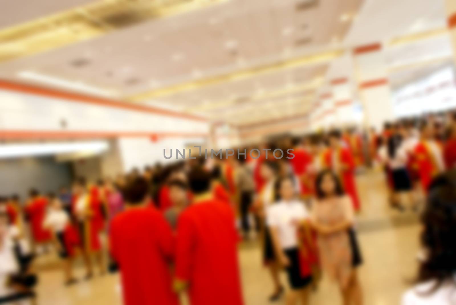 Abstract blurred people at exhibition or in a museum