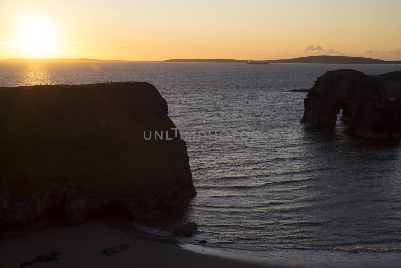 beautiful sunset over the nuns beach and virgin rock on the wild atlantic way