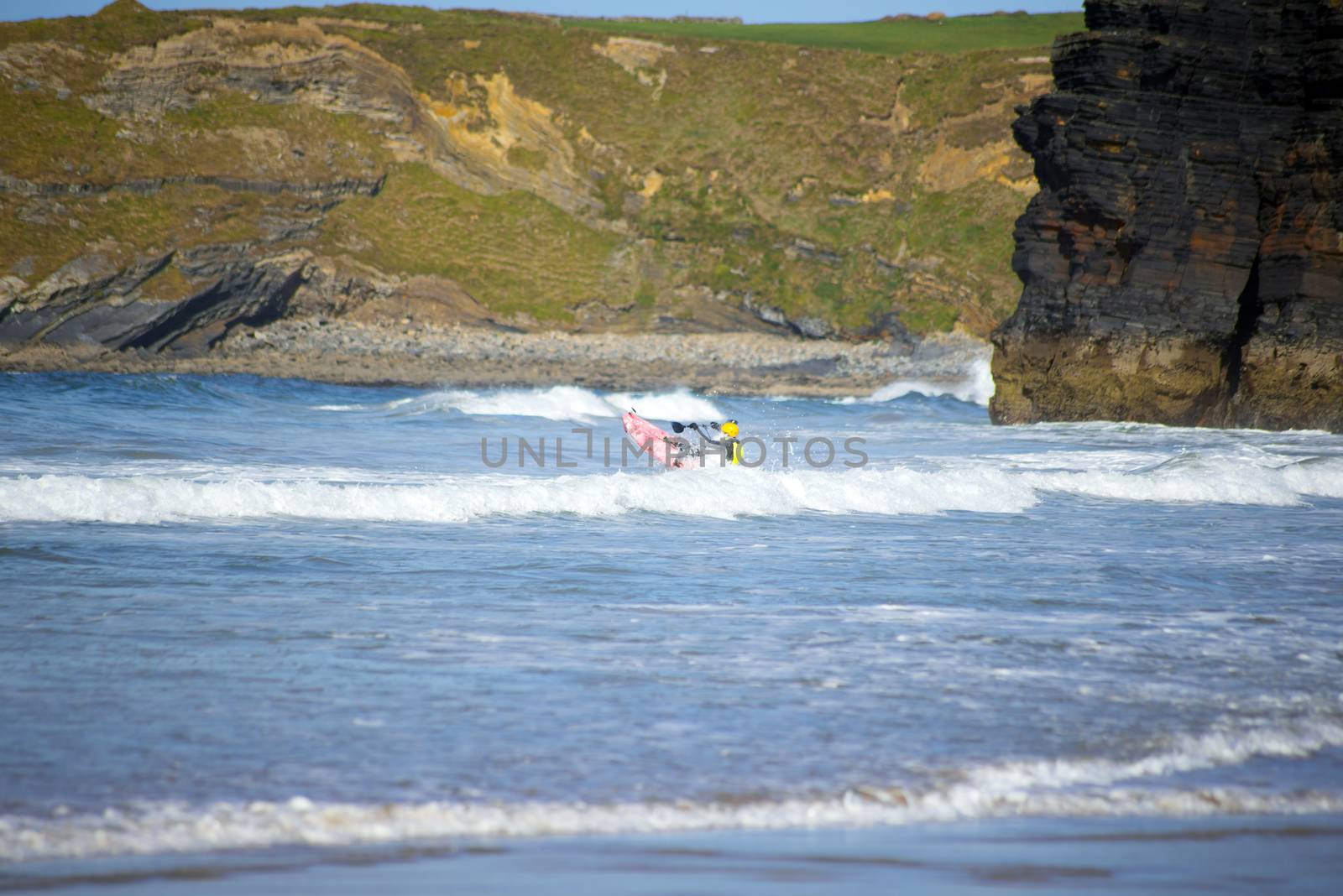 sunshine winter view of kayaker at ballybunion by morrbyte