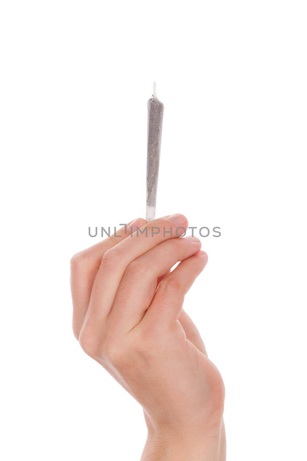 Male hand holding cannabis joint isolated on white background. Medical marijuana.