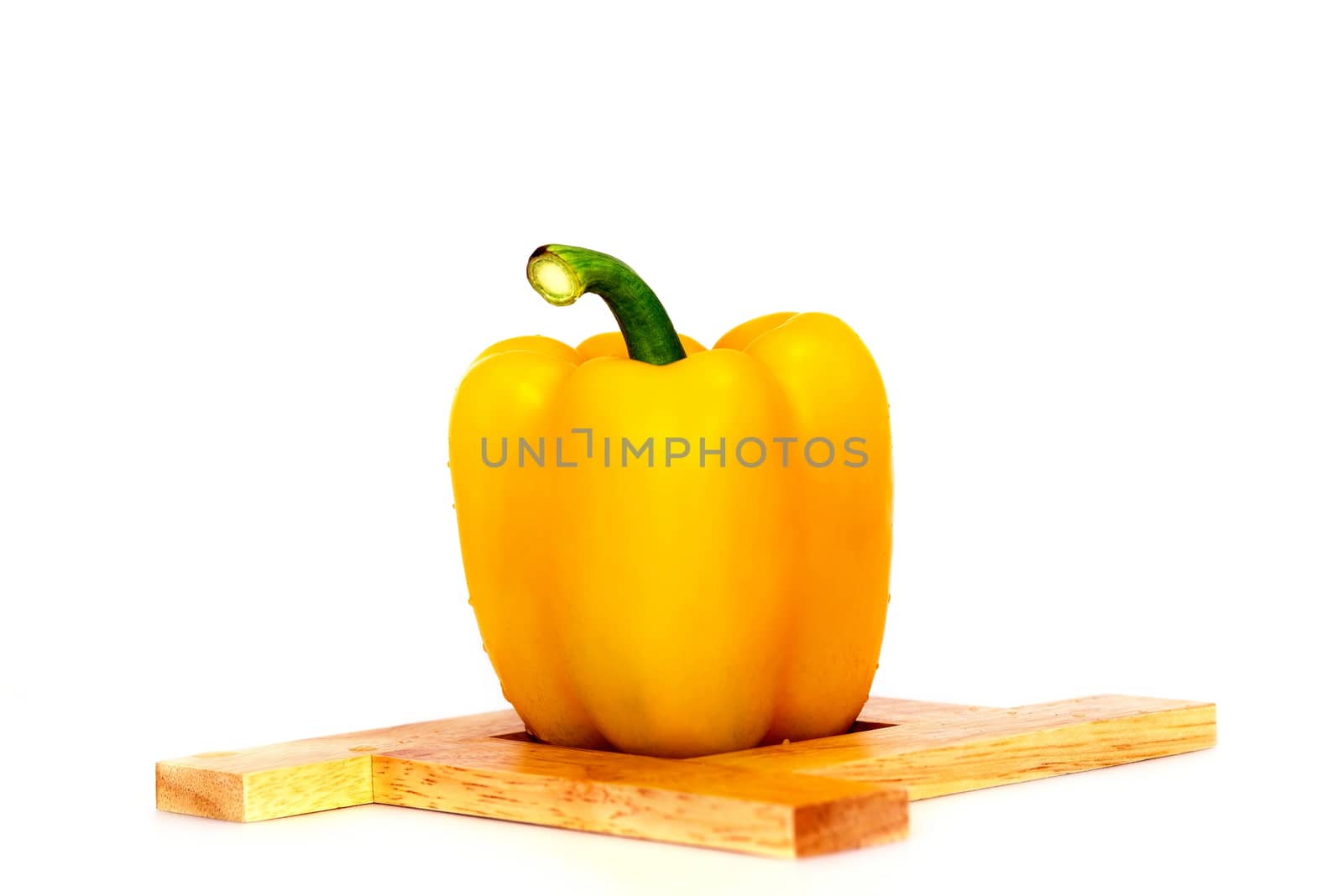 Yellow Sweet bell pepper (capsicum) isolated on white  by Yuri2012