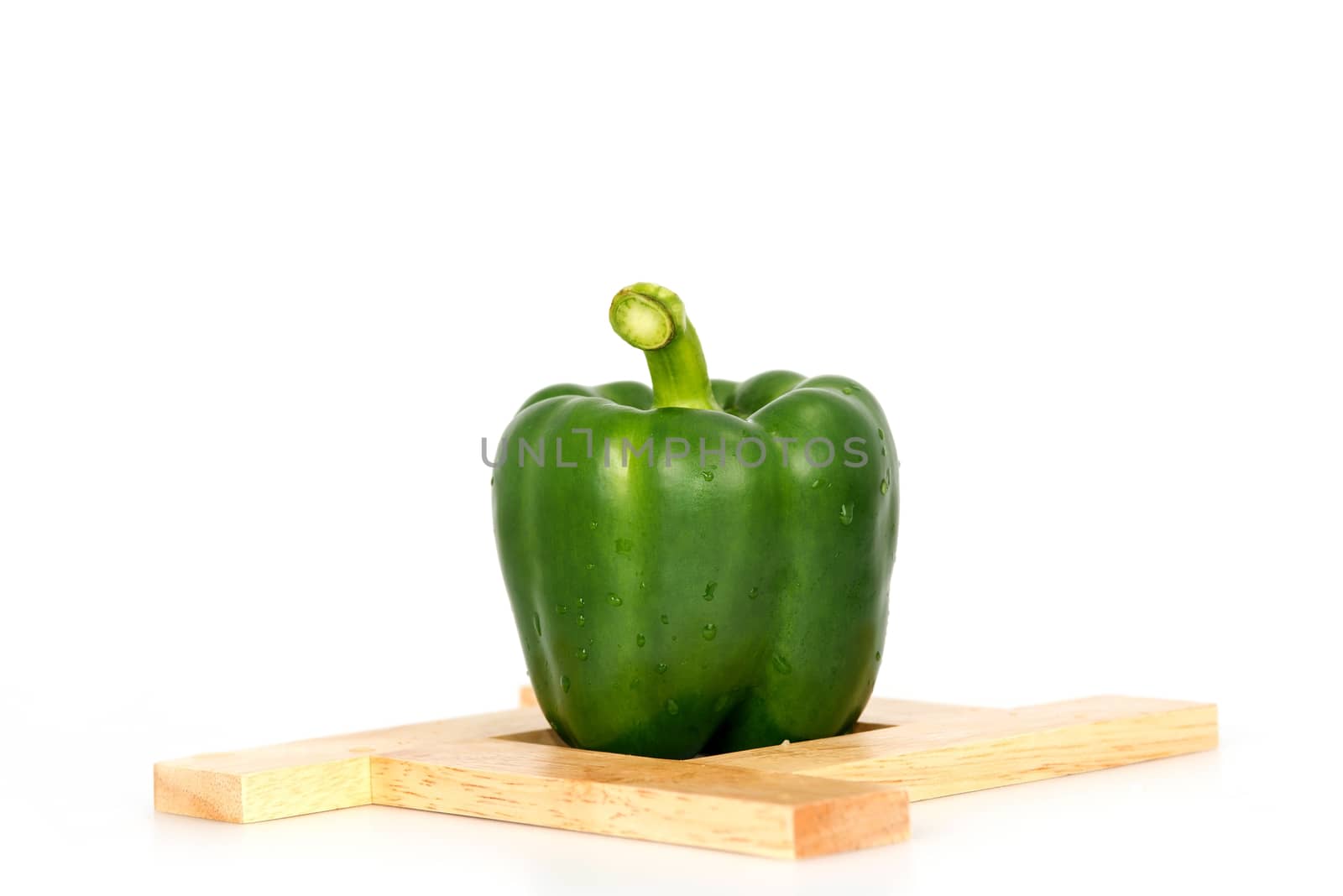 Green Sweet bell pepper (capsicum) isolated on white background