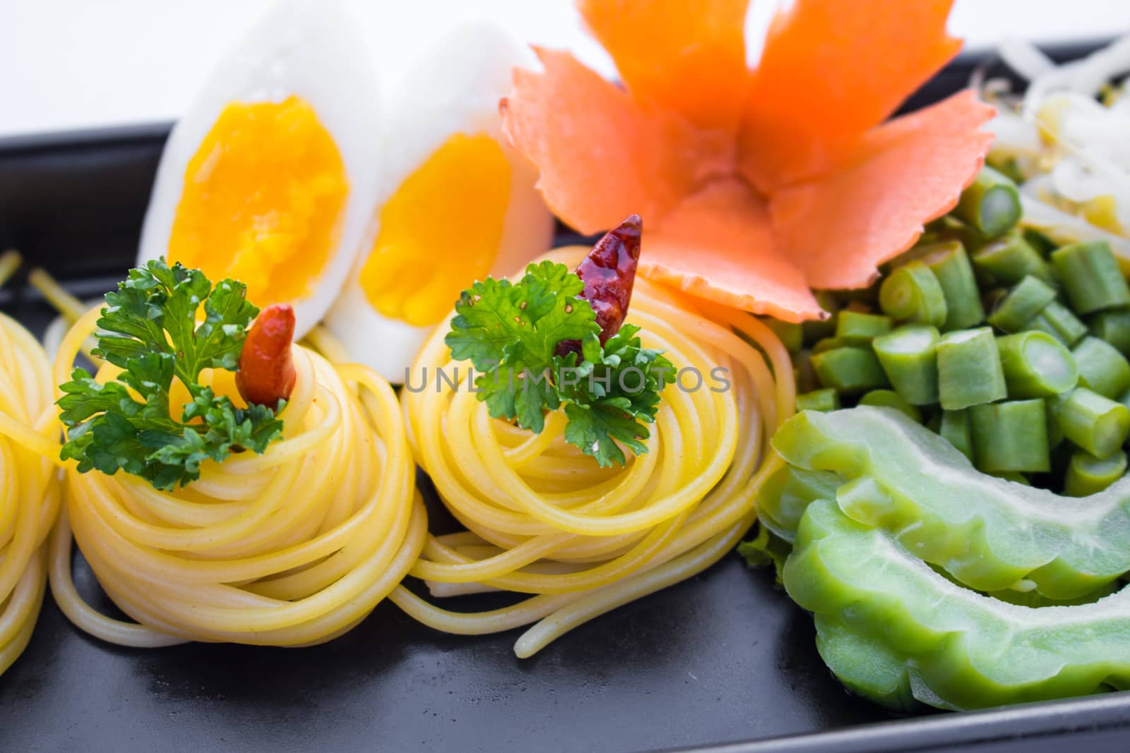 Spaghetti garlic oil and red chili pepper .