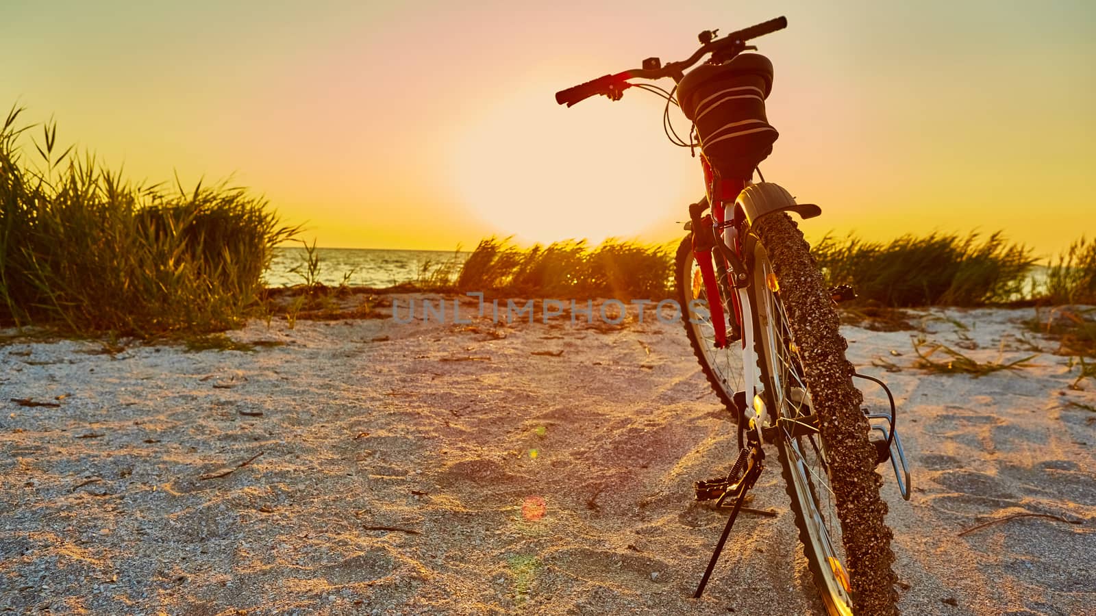 Bicycle at the beach on twilight time