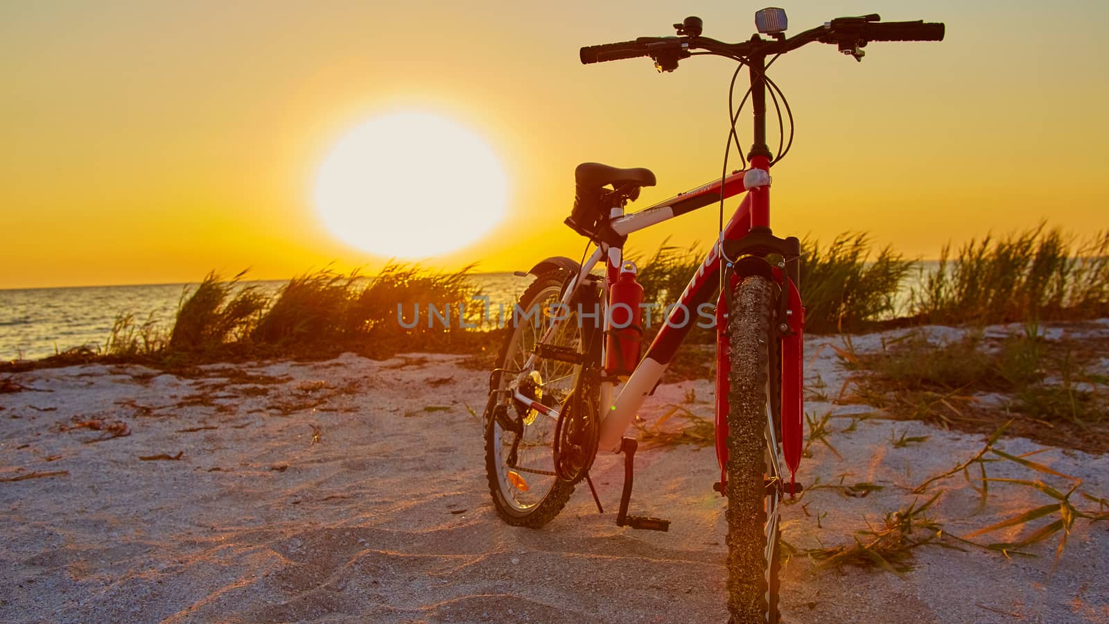 Bicycle at the beach on twilight time