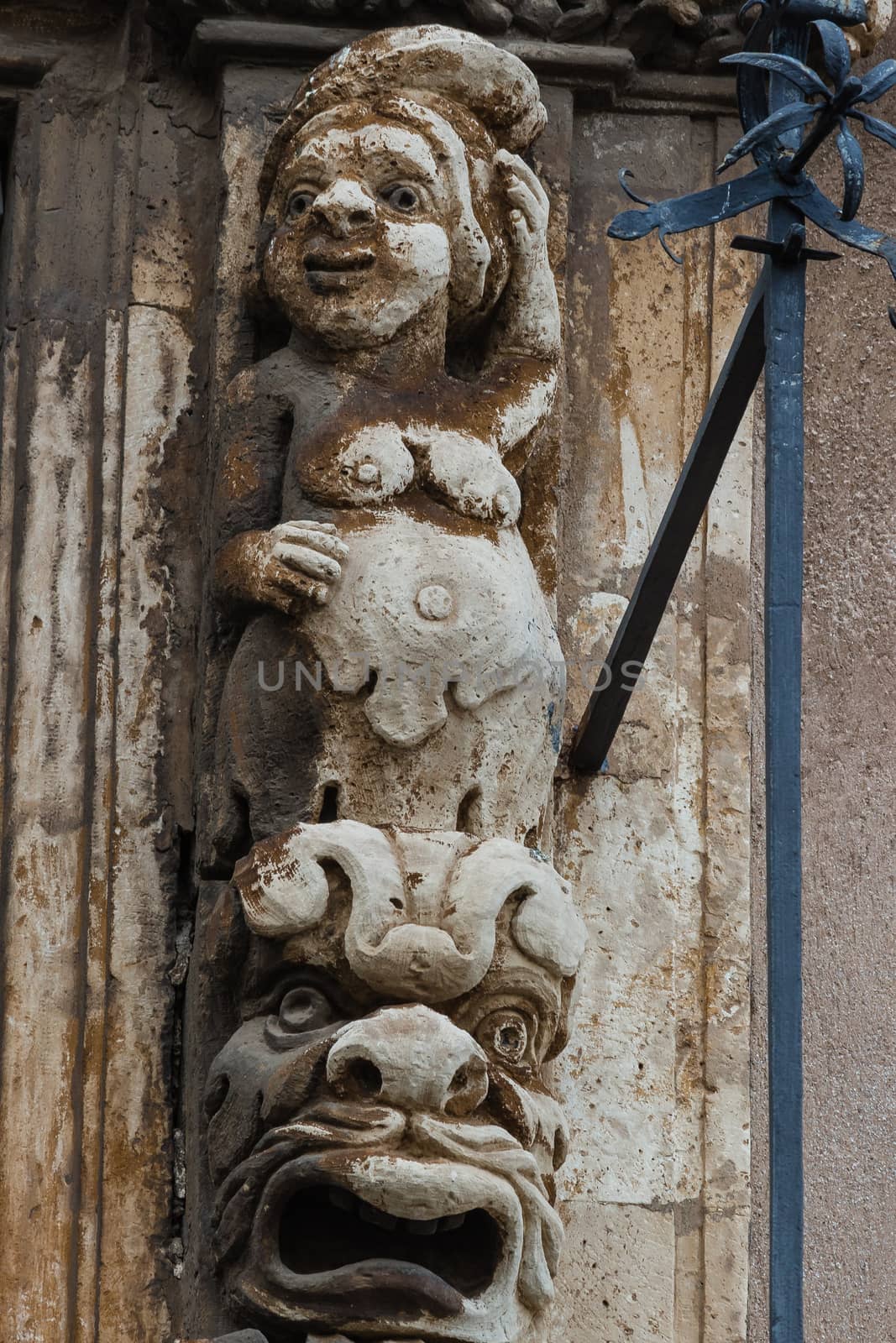 The detail of a baroque balcony in sicily