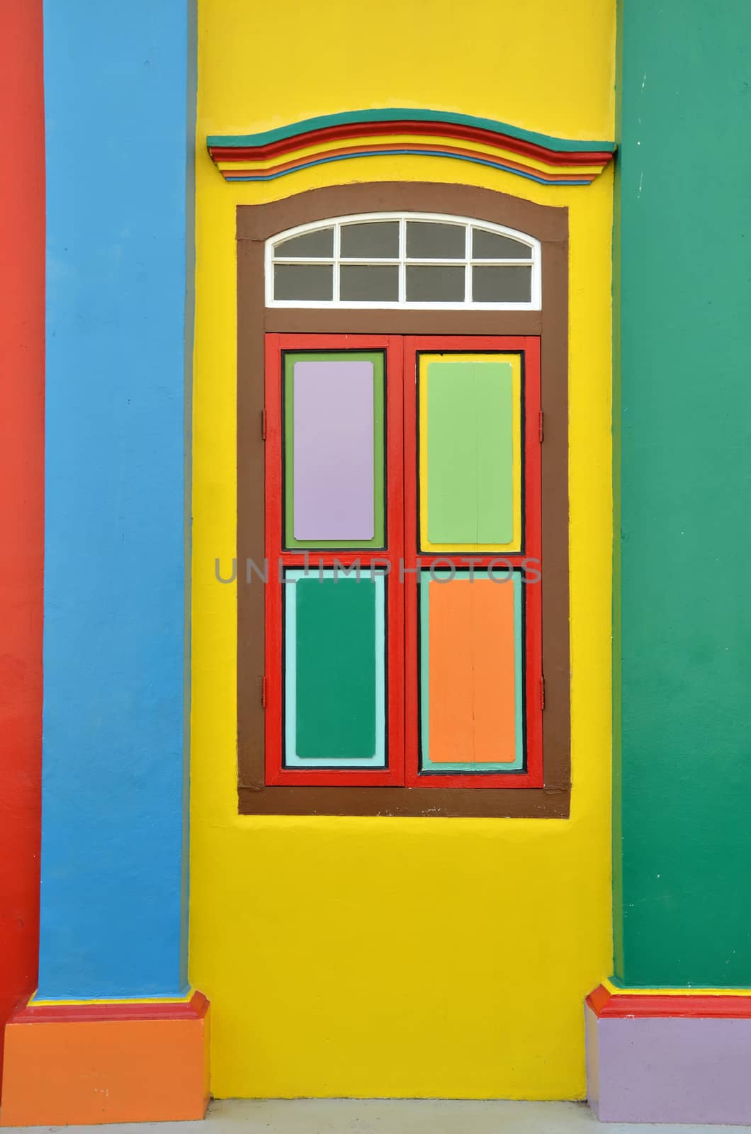 Colorful windows and details on a colonial house in Little India by tang90246