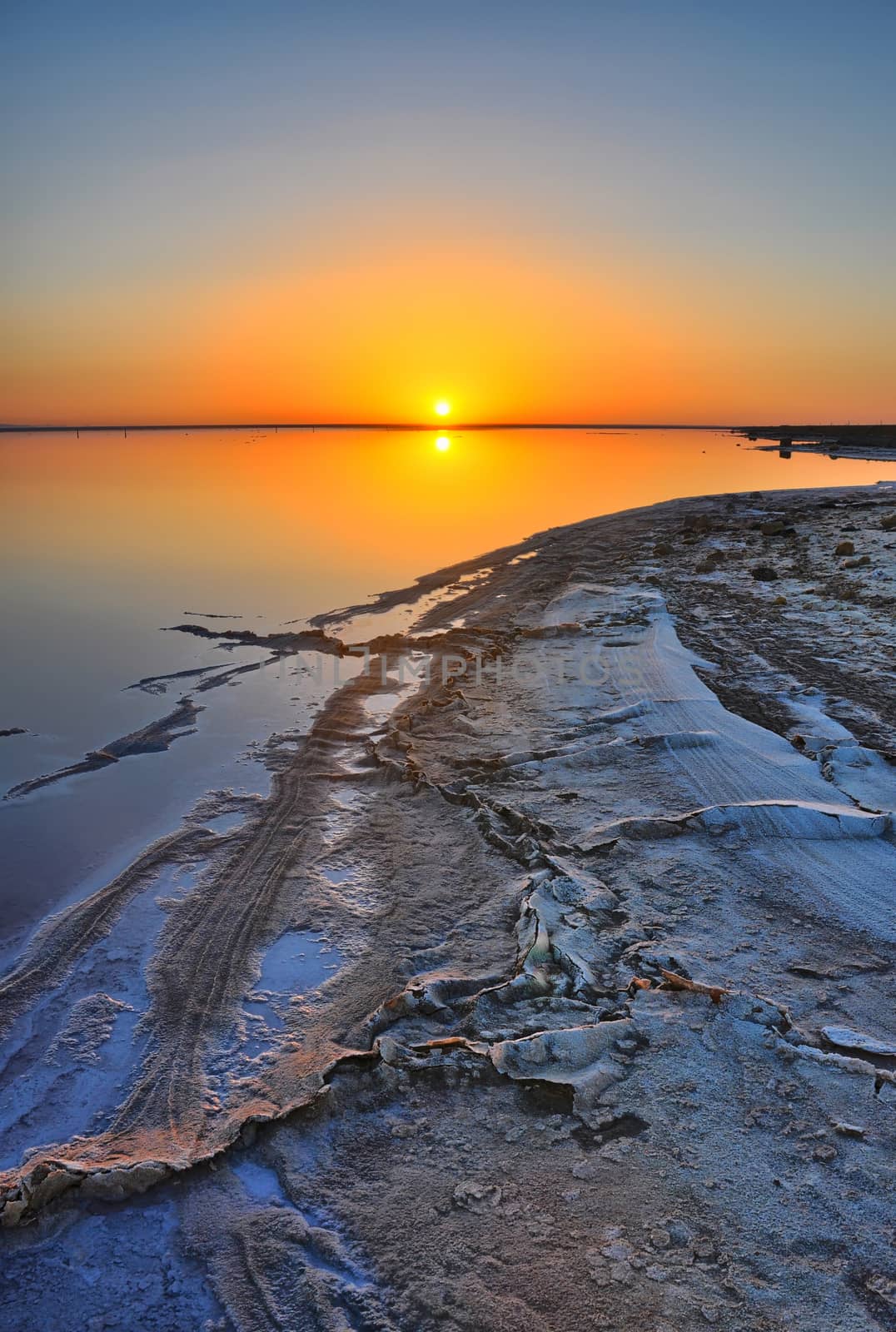 Beautiful sunrise on salt lake Chott el Djerid, Sahara desert, T by Eagle2308