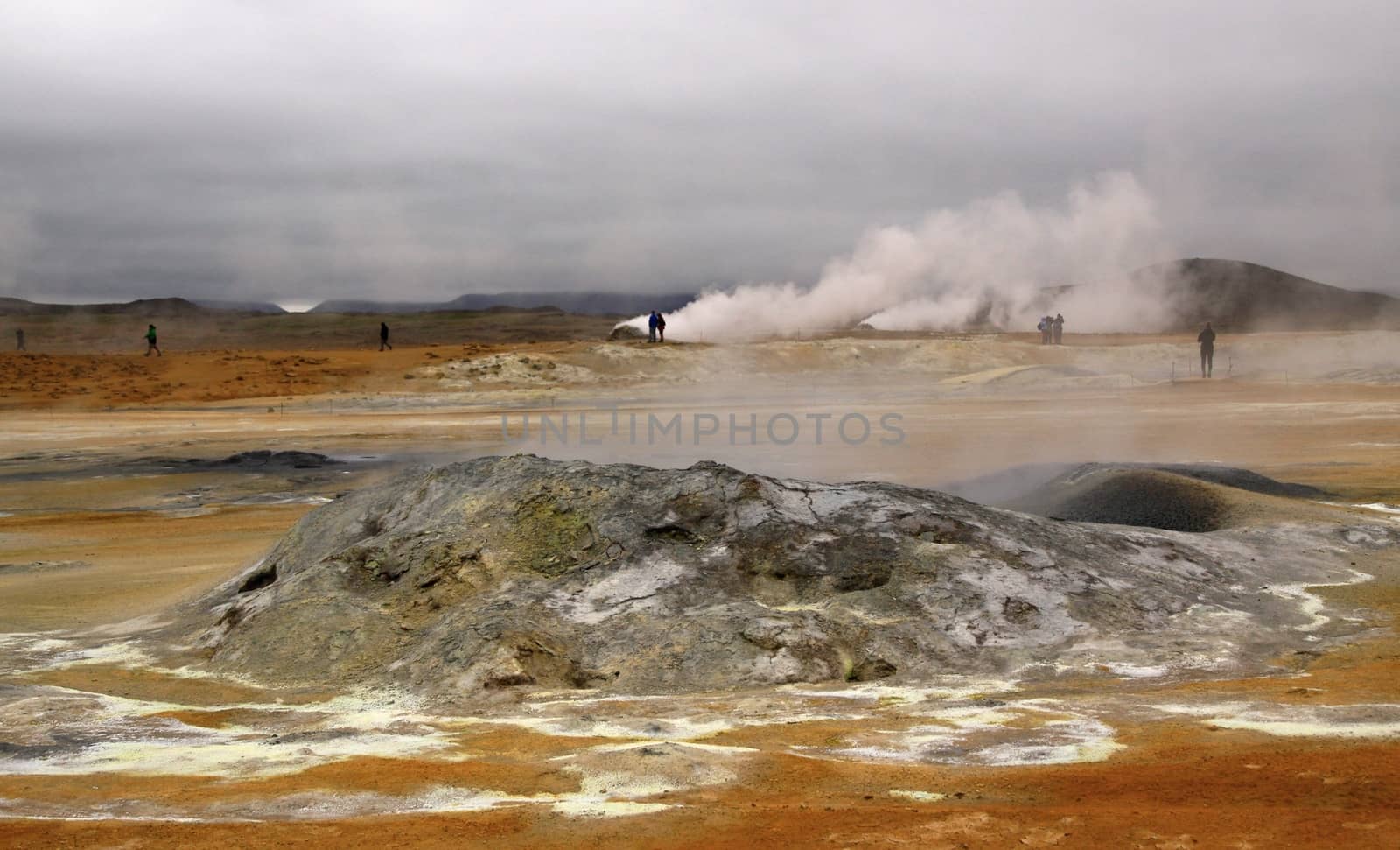 volcano and geyser with steam in national park,Iceland