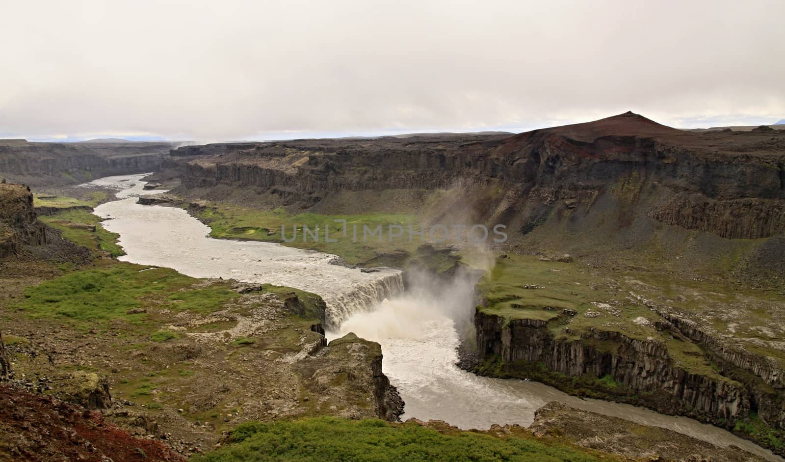 The river and big waterfall on Iceland