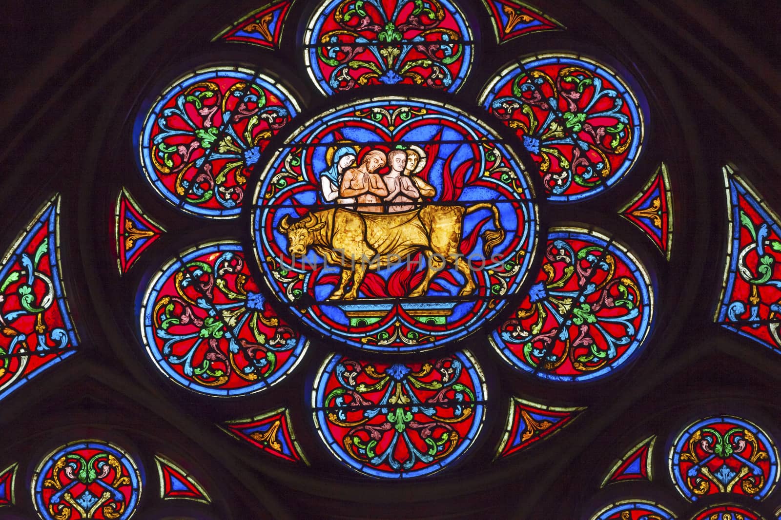 Saint Eustace Saint Antipas Roasted To Death Brazen Bronze Bull Stained Glass Notre Dame Cathedral Paris France.  Notre Dame was built between 1163 and 1250AD.  