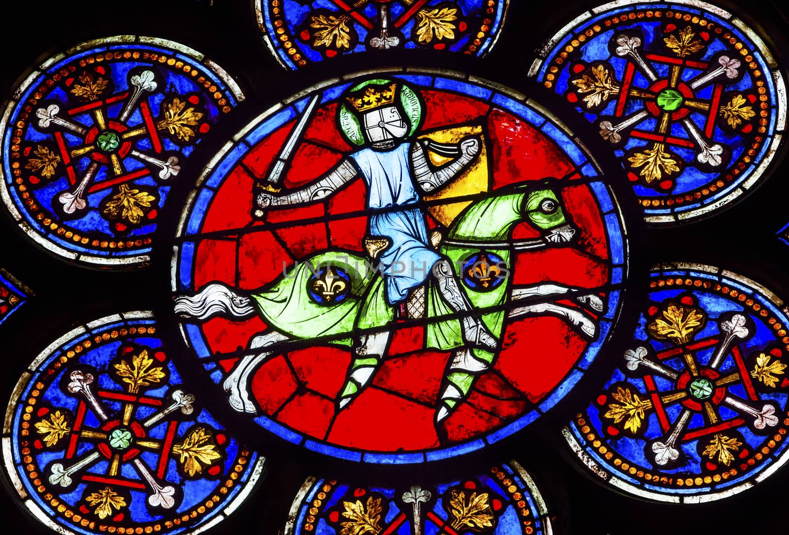 Armed Knight Sword Stained Glass Notre Dame Cathedral Paris France.  Notre Dame was built between 1163 and 1250AD.  