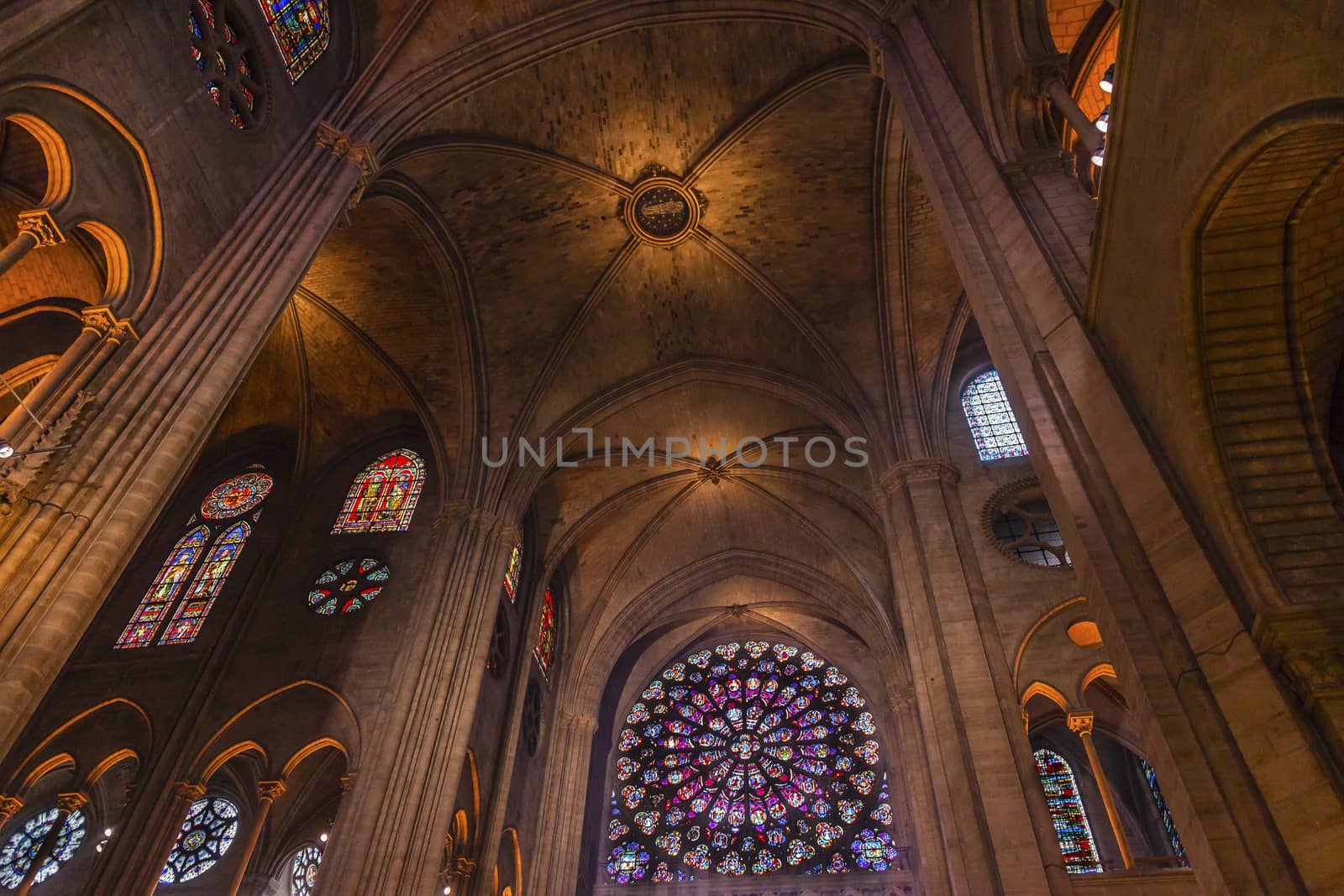 Interior Arches Gothic  Stained Glass Notre Dame Cathedral Paris France.  Notre Dame was built between 1163 and 1250 AD.  