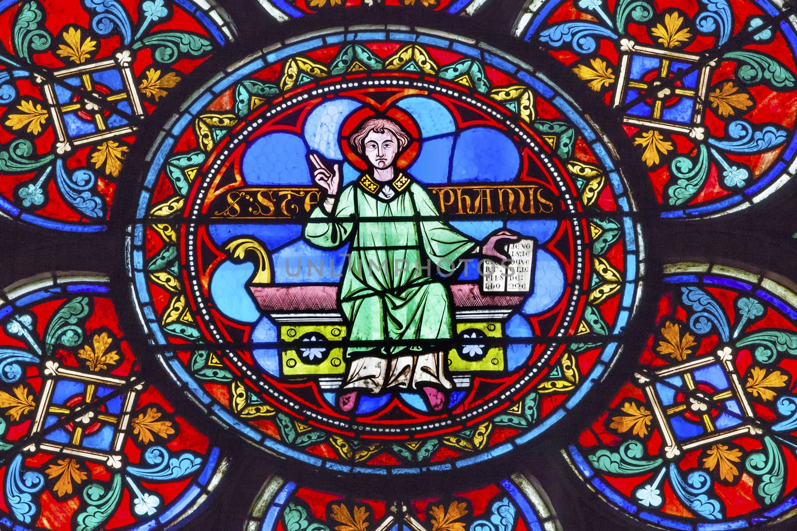 Saint Stephen Stained Glass Notre Dame Cathedral Paris France.  Notre Dame was built between 1163 and 1250AD.  