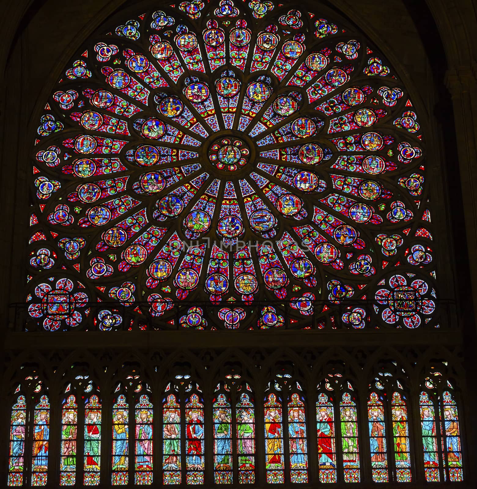 North Rose Window Virgin Mary Jesus Disciples Stained Glass Notre Dame Cathedral Paris France.  Notre Dame was built between 1163 and 1250 AD.  Virgin Mary Rose Window oldest in Notre Dame from 1250.