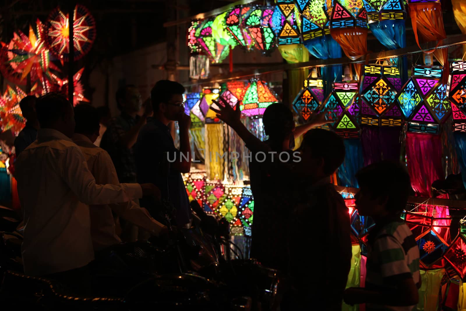 Pune, India - November 7, 2015: People in India shopping for sky lanterns on the occasion of Diwali festival in India