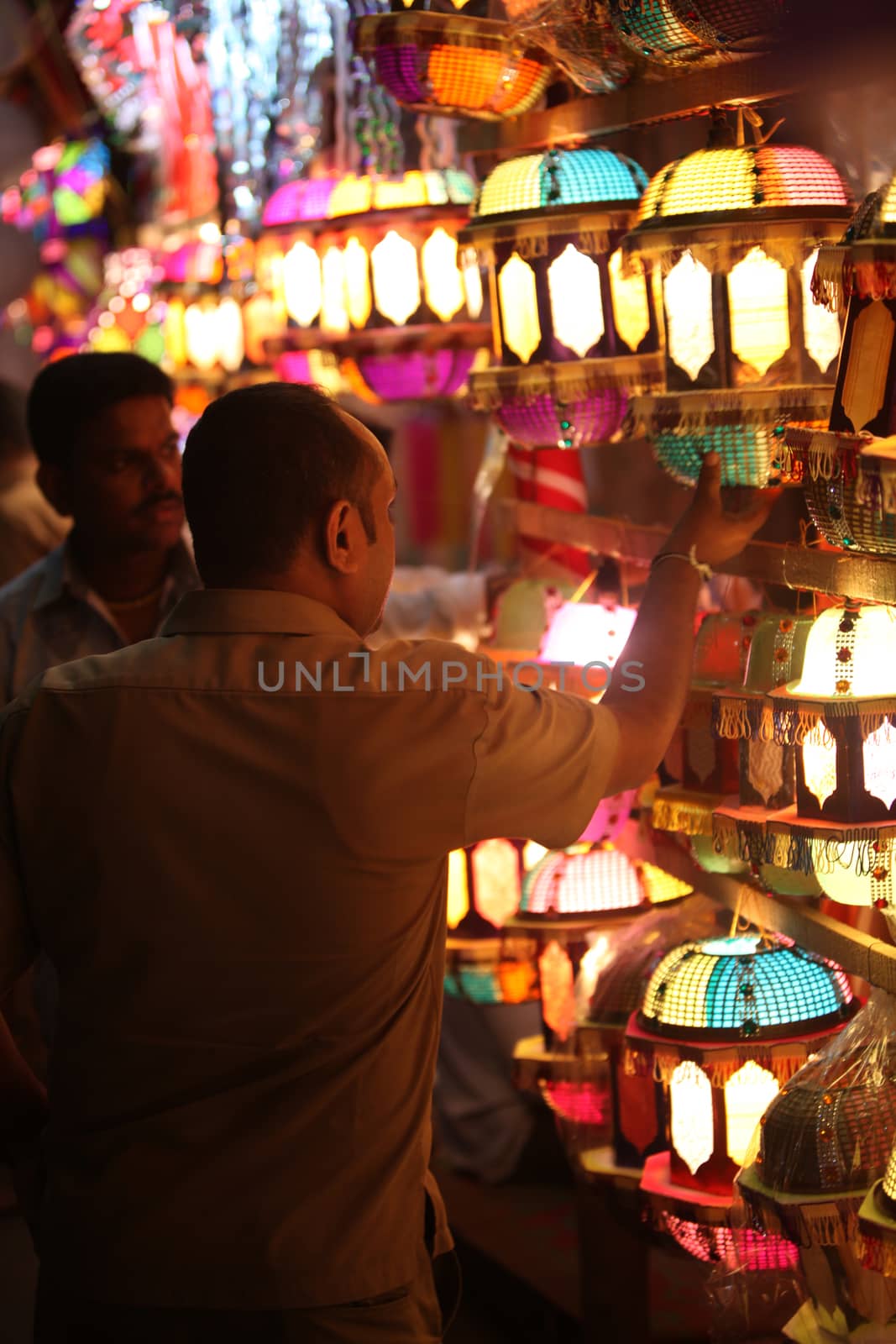 Pune, India - November 7, 2015: A streetside shopkeeper showing  by thefinalmiracle