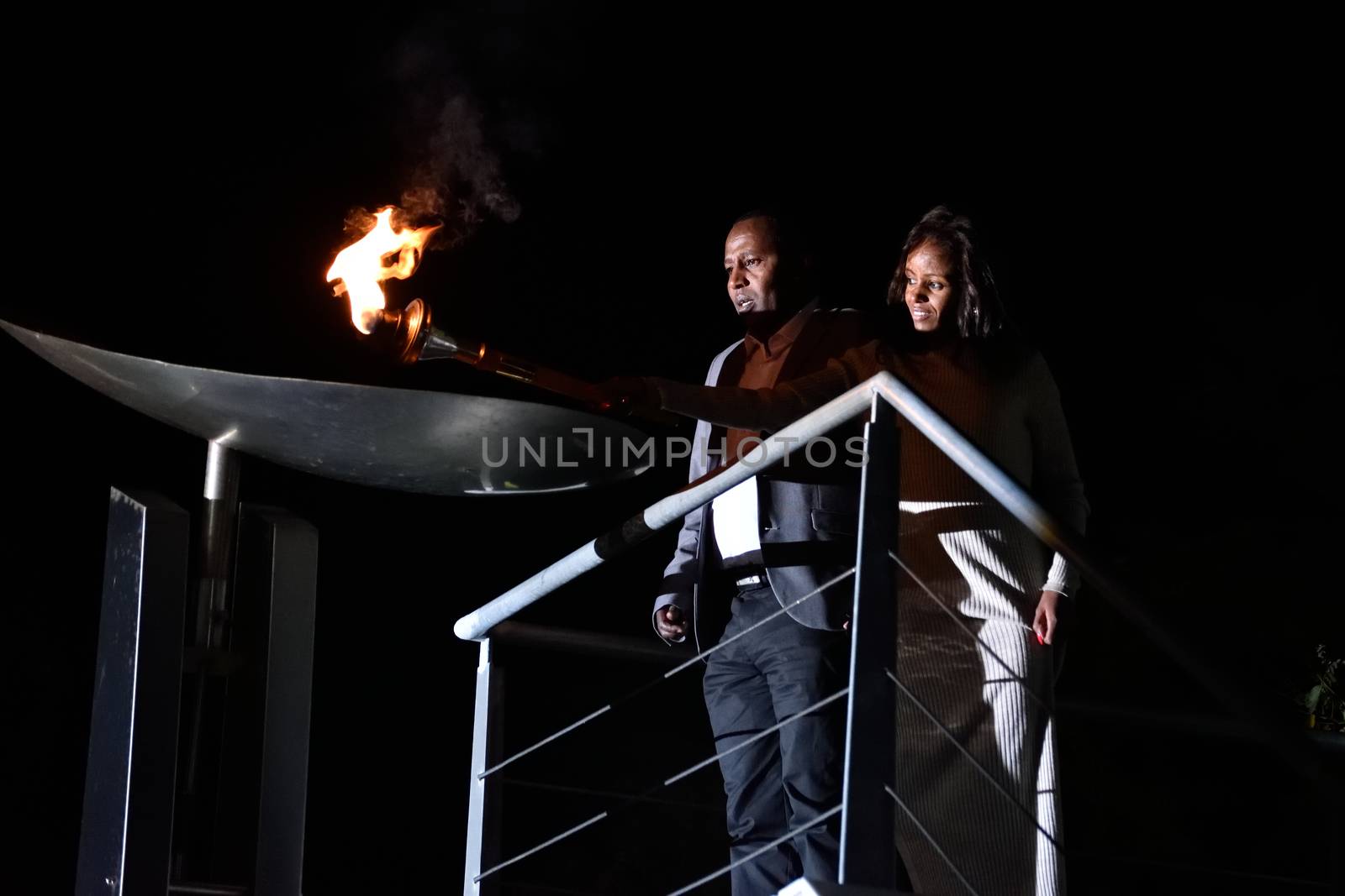 GREECE, Athens: Mare Dibaba, winner of the 2015 marathon at the world championships in Beijing, lights the altar during the Ceremony of the Lighting of the Marathon Flame at the Marathon Tomb in Athens, Greece, on November 7, 2015.