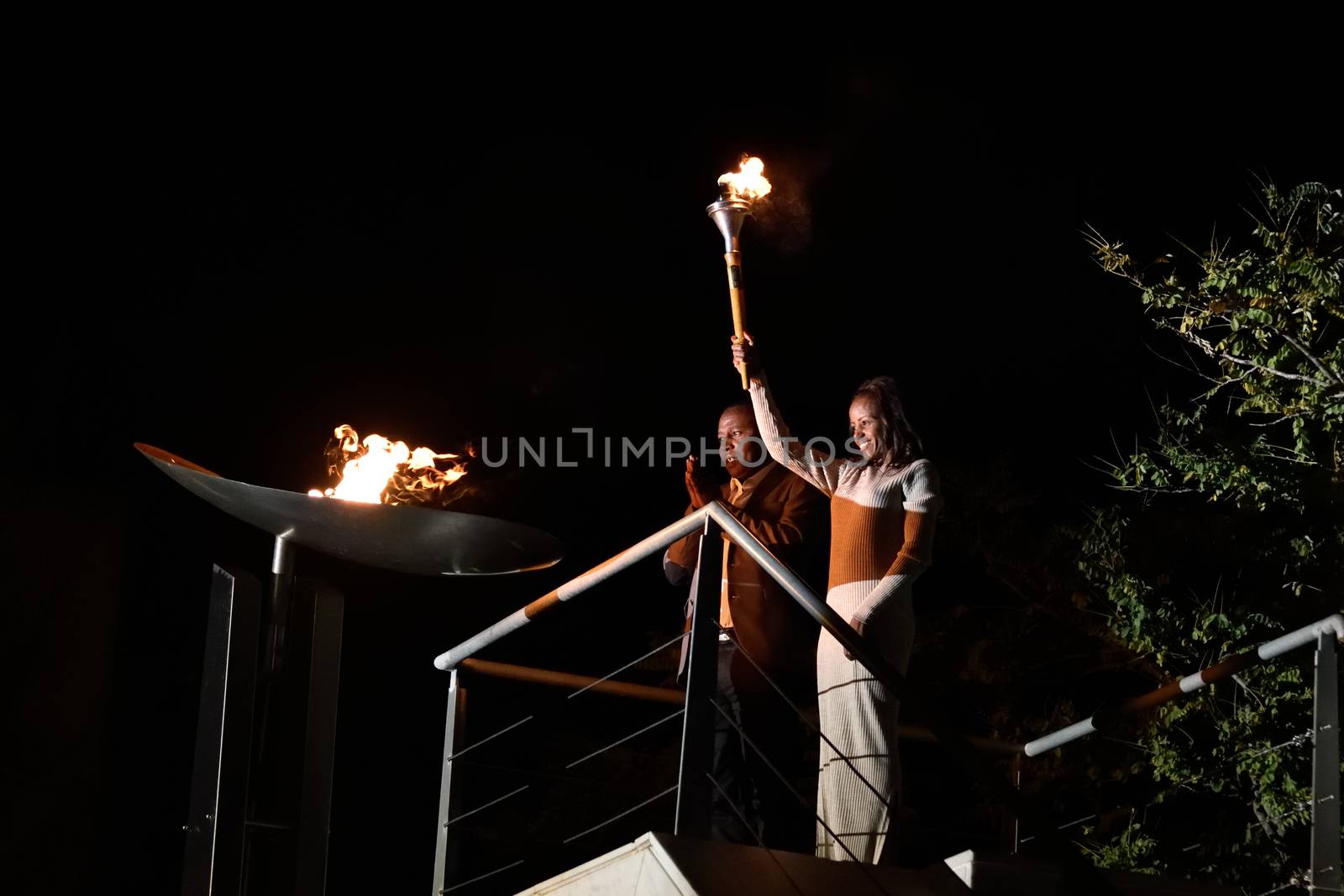 GREECE, Athens: Mare Dibaba, winner of the 2015 marathon at the world championships in Beijing, lights the altar during the Ceremony of the Lighting of the Marathon Flame at the Marathon Tomb in Athens, Greece, on November 7, 2015.