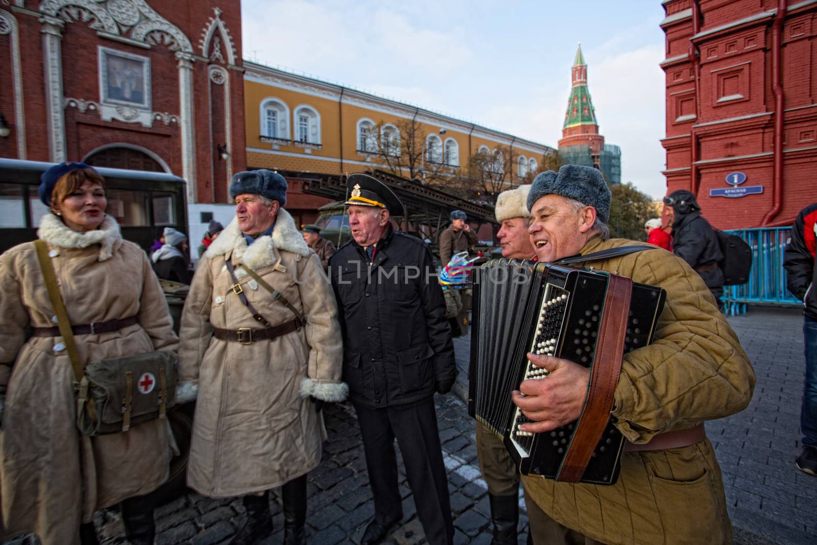 RUSSIA, Moscow: A man plays the accordion on the Red Square during a parade in commemoration of the historical 1941 military parade in Moscow, Russia, on November 7, 2015. 