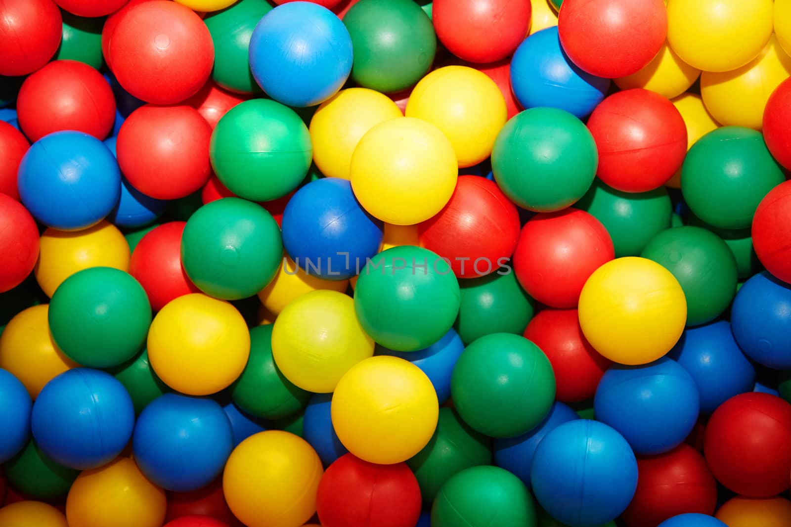 Group of many multicolored plastic balls. Close-up view