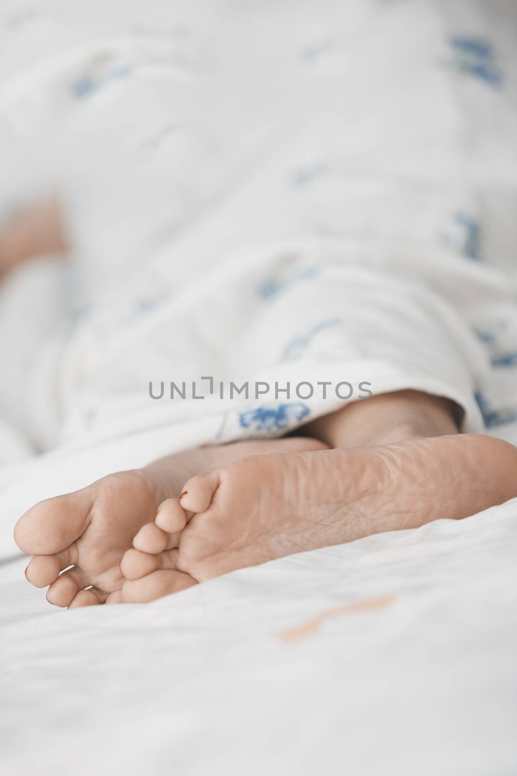 Feet of woman. Vertical photo