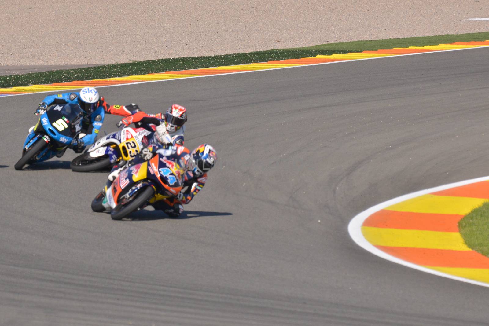 SPAIN, Cheste: Italian pilot Niccolo Antonelli (C) falls during Valencia Motor GP tournament at Ricardo Tormo circuit in Valencia, Spain on November 8, 2015.Miguel Oliveira won the race and Danny Kent took Moto3 title.