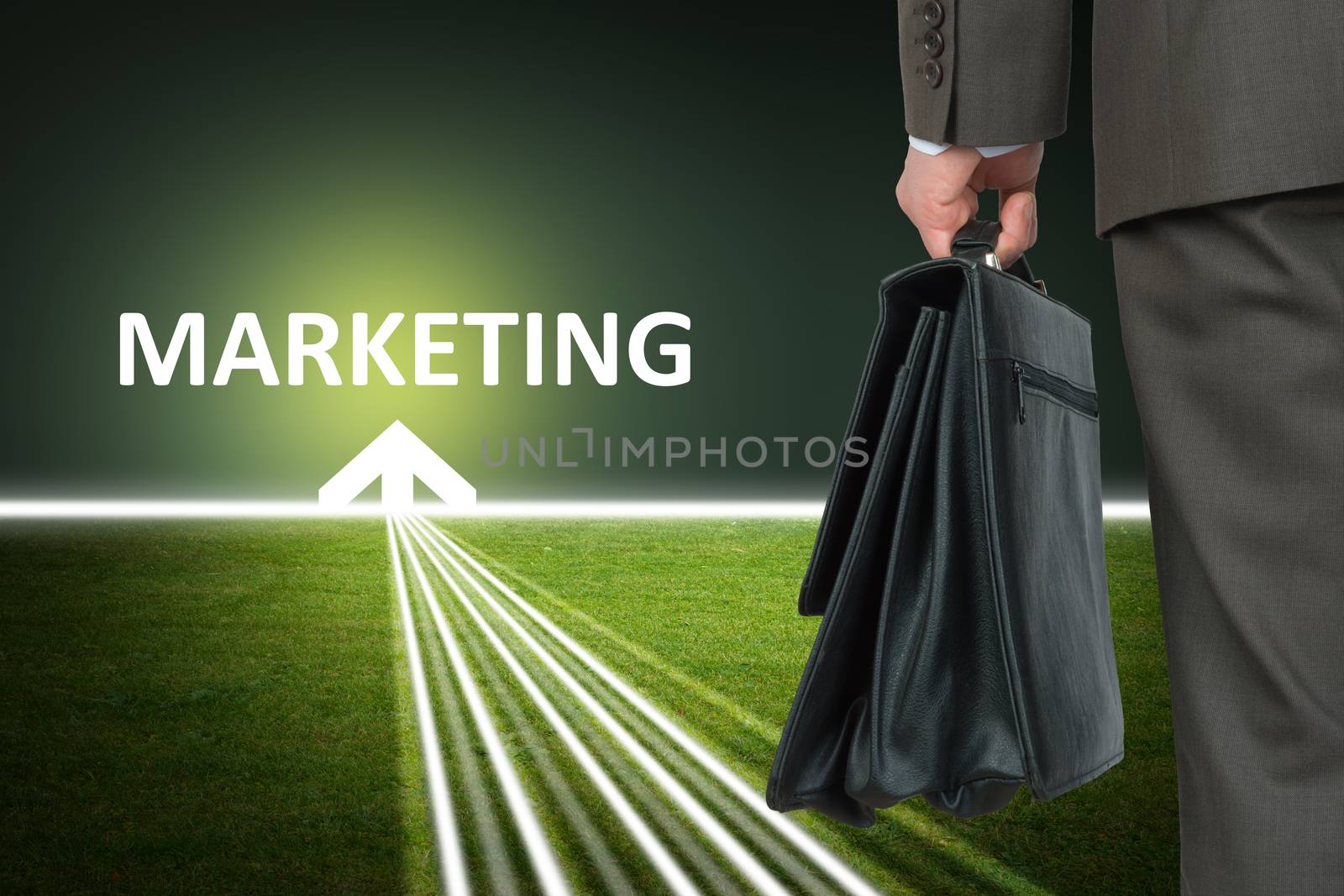 Businessman with case and word marketing by cherezoff