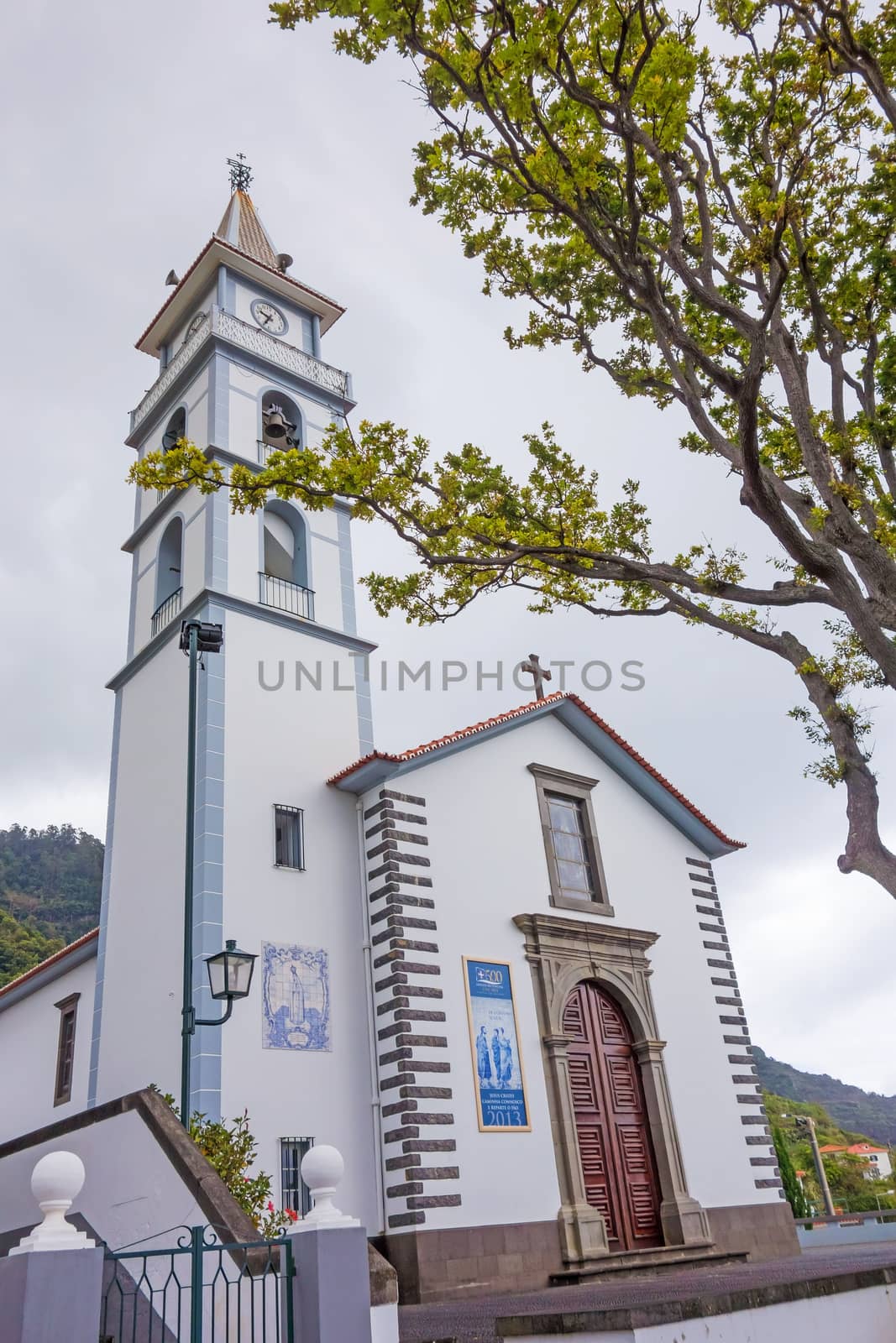 Faial, Portugal - June 7, 2013: Church of Faial, Cemiterio do Faial (Cemetery of Faial). The church with cemetery is located in the center of the village Faial.