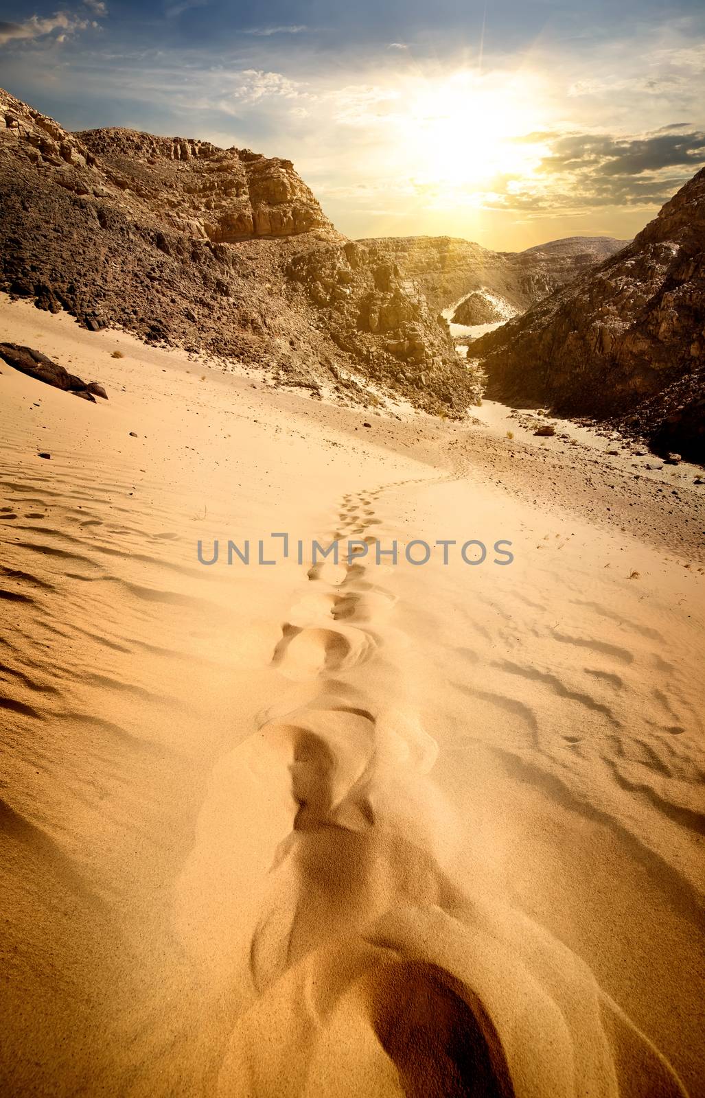 Mountains and sand dunes at the sunset