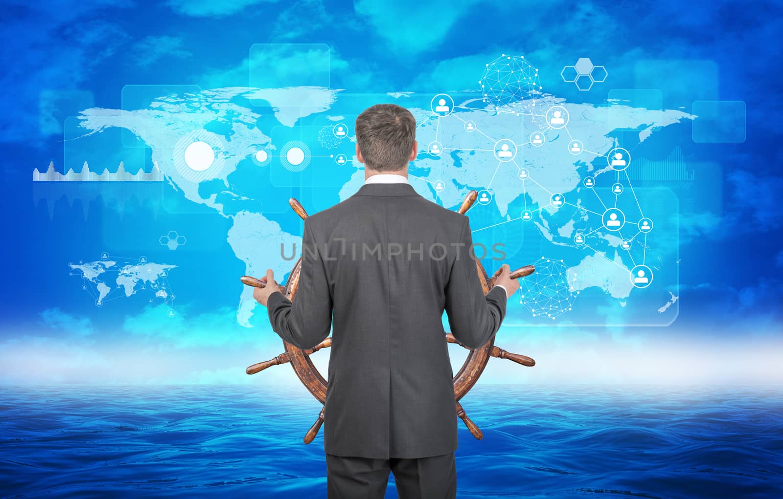 Businessman holding steering wheel on sea background with world map