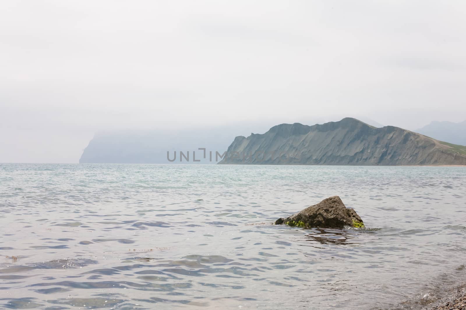 Grey mountains and blue sea in Crimea
