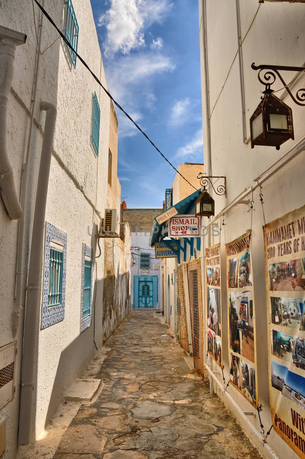 HAMMAMET, TUNISIA - OCT 2014: Narrow street of ancient Medina on by Eagle2308