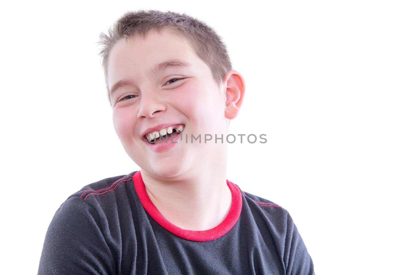 Head and Shoulders Close Up Portrait of Young Boy Wearing Black and Red Shirt Laughing and Showing Braces in Bright Studio with White Background and Copy Space