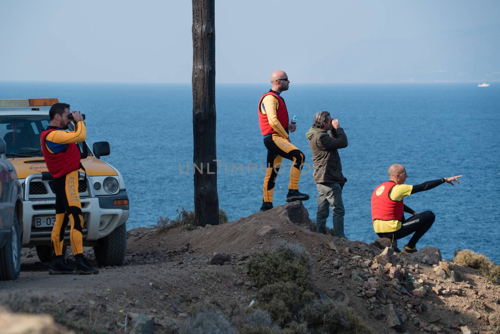 GREECE, Lesbos: A fresh group of refugees arrive under the supervision of the Greek and Turkish coast guards on November 8, 2015