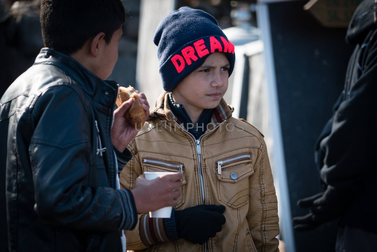 GREECE, Lesbos: A fresh group of refugees arrive under the supervision of the Greek and Turkish coast guards on November 8, 2015