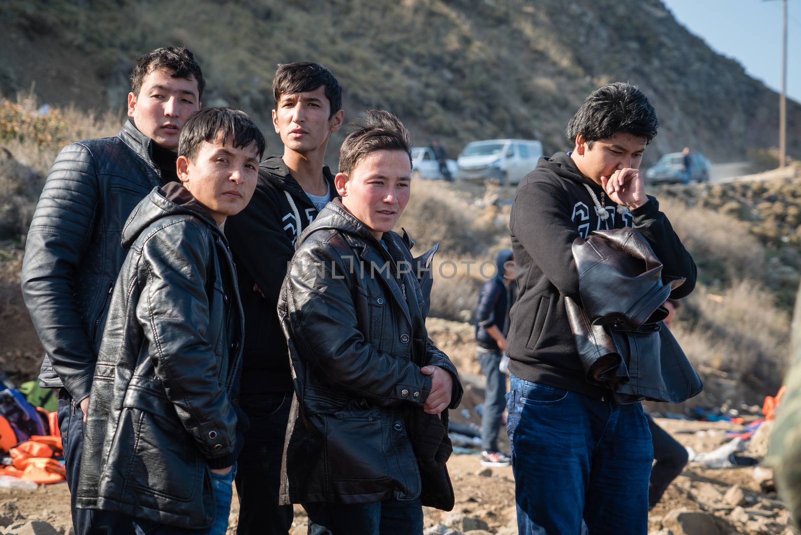 GREECE, Lesbos: A fresh group of refugees arrive under the supervision of the Greek and Turkish coast guards on November 8, 2015 