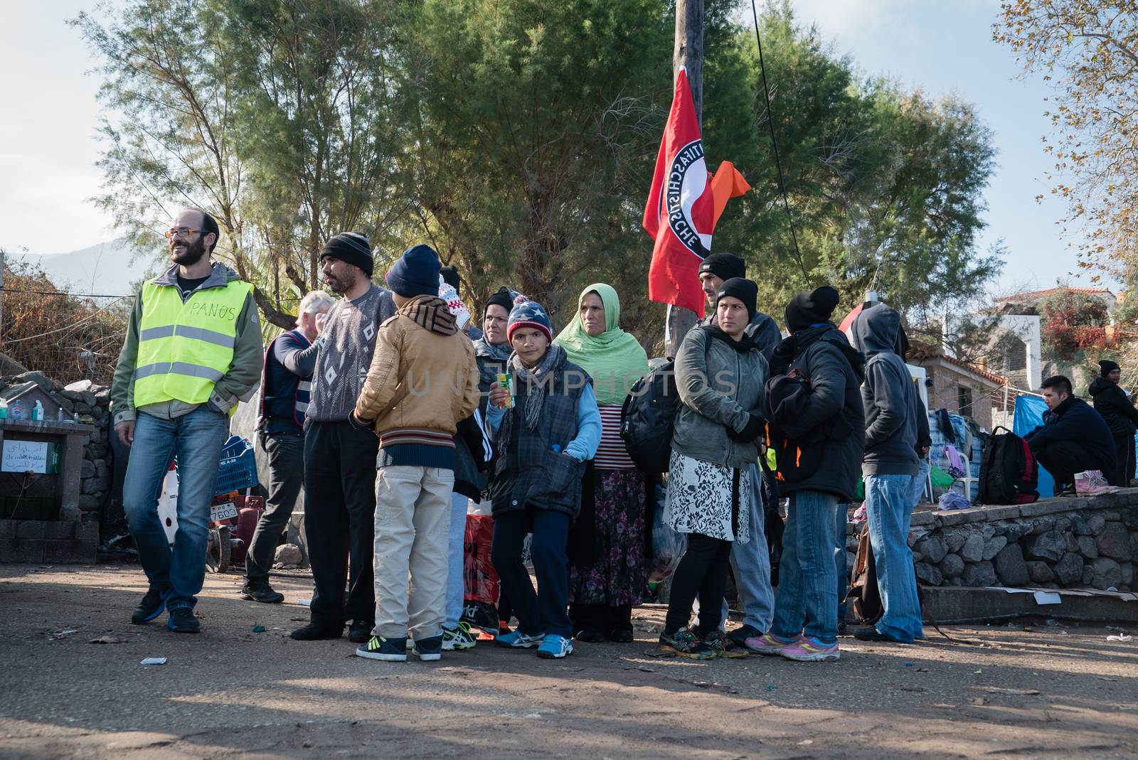 GREECE, Lesbos: A fresh group of refugees arrive under the supervision of the Greek and Turkish coast guards on November 8, 2015