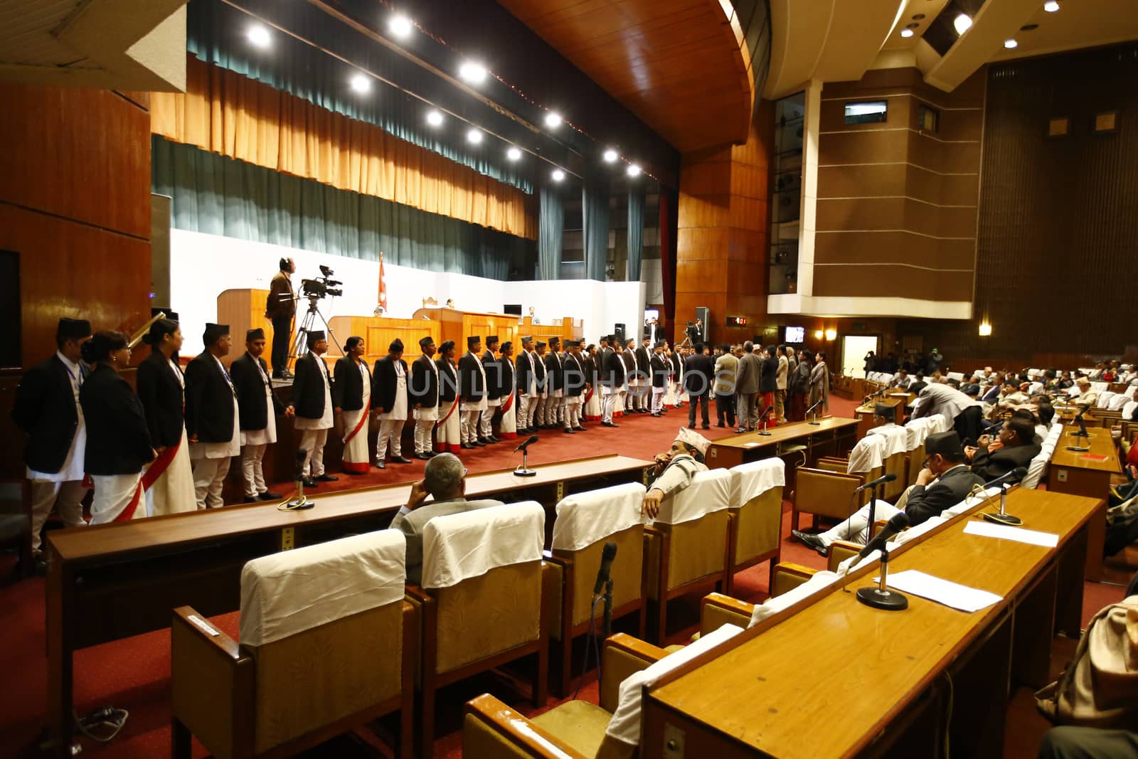 NEPAL, Kathmandu:  As unrest continues in Nepal surrounding the nation's new constitution, protesters from Nepal's indigenous Madhesi community disrupted a parliamentary meeting in Kathmandu on November 8, 2015. Demanding more government representation, these indigenous people have placed blockades at all border crossings with India for the past three months, moving Nepal closer and closer to a humanitarian crisis.  As the United Democratic Madhesi Front took the stage to disrupt the parliamentary meeting, lawmakers backing the protesters chanted pro-Madhesi slogans. 