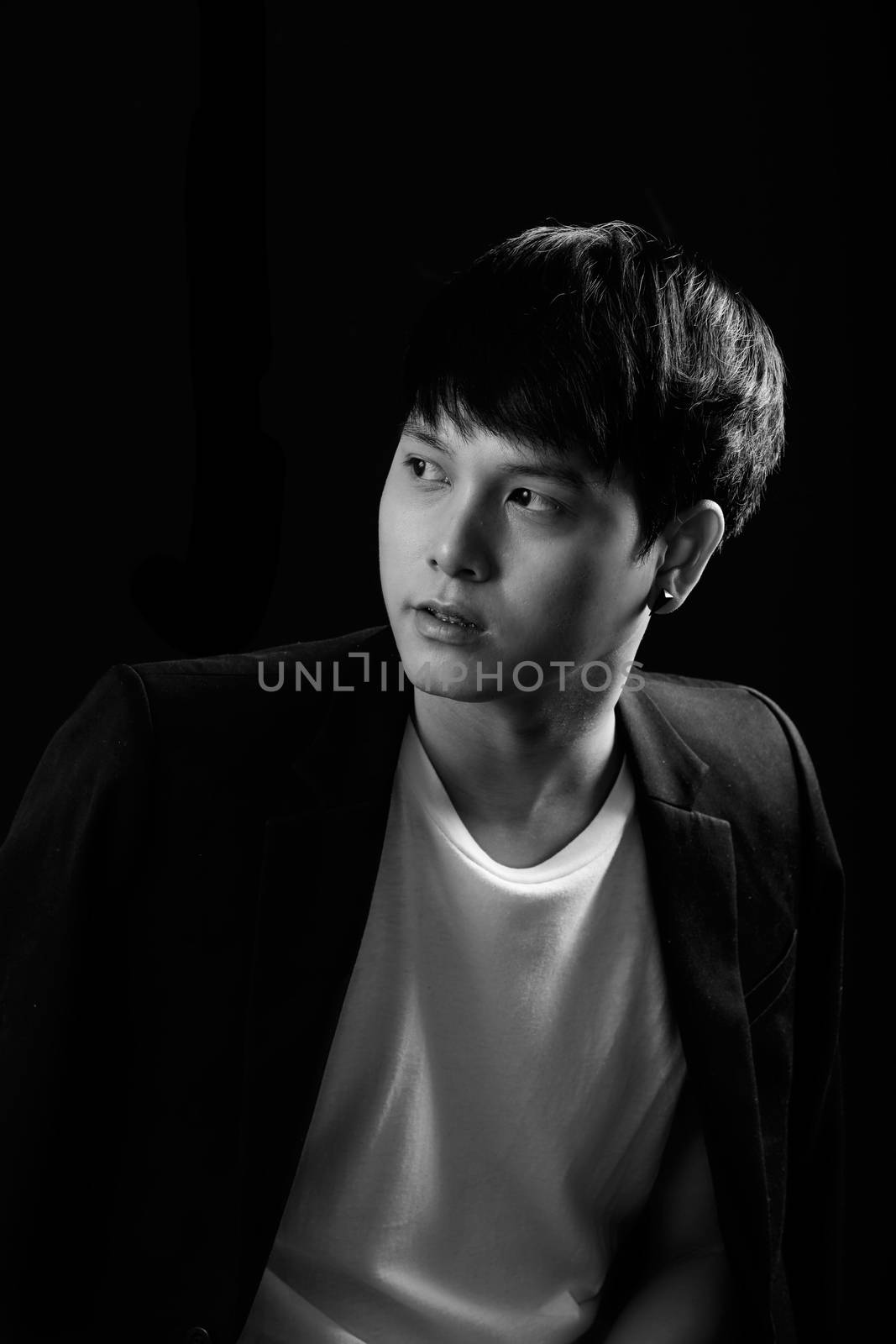 Black and white portrait of Asian guy