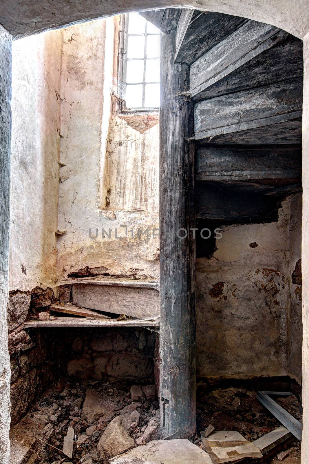 Old broken wooden spiral staircase by Mibuch